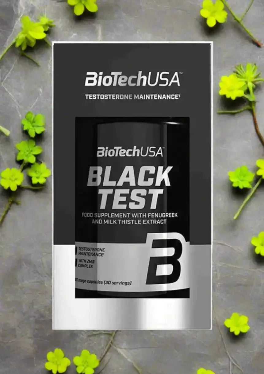 BiotechUSA Black Test 90 Kapseln Nahrungsergänzung Testosteron, schwarze Verpackung auf grauem Hintergrund mit grünen Kleeblättern