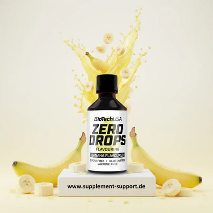 BioTechUSA Zero Drops Banane Geschmack Aromatropfen vor Bananen und einem gelben Spritzer