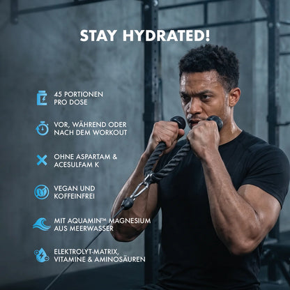 Athlet trainiert mit Seilzug im Fitnessstudio – Stay Hydrated! Mit Electrolyten, Vitaminen & Aminosäuren