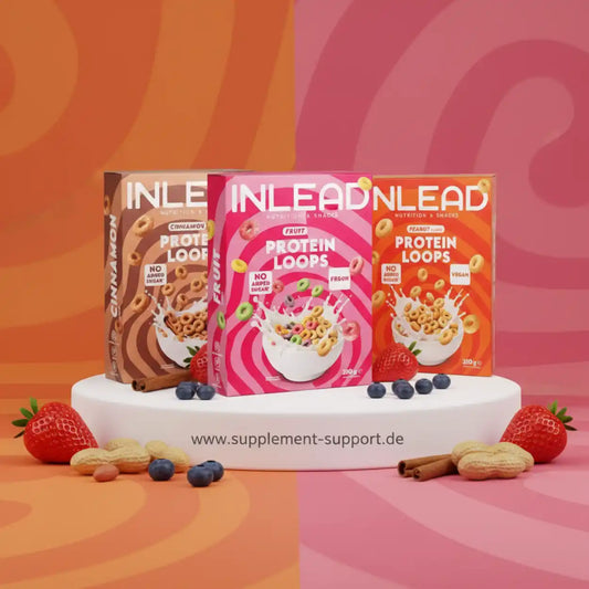 Drei Packungen Inlead Protein Loops in Zimt, Frucht und Erdnuss mit frischen Zutaten.