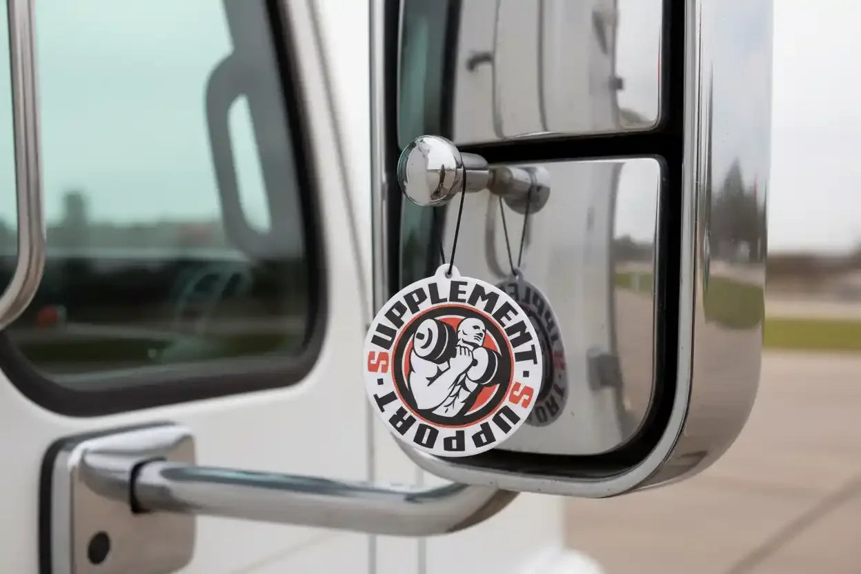 Supplement Support Luftfrischer am LKW-Spiegel mit Muskelmann-Logo